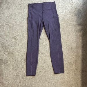 Lululemon heathered purple 25” invigorate leggings with pockets. Size 6.